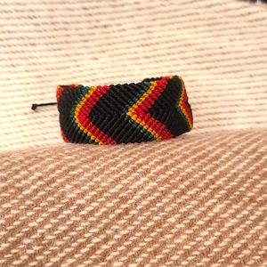 Handmade Macrame Cuff Bracelet. Black, Red, Yellow, Green Arrow Design